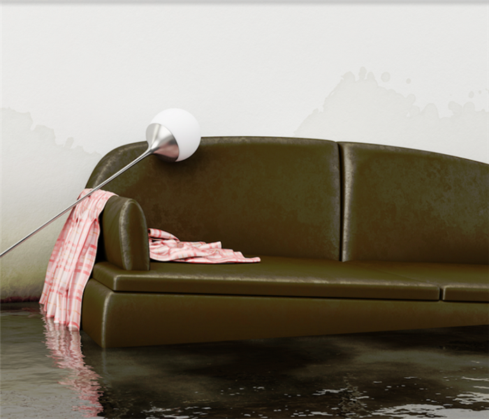 a flooded living room with a floating couch