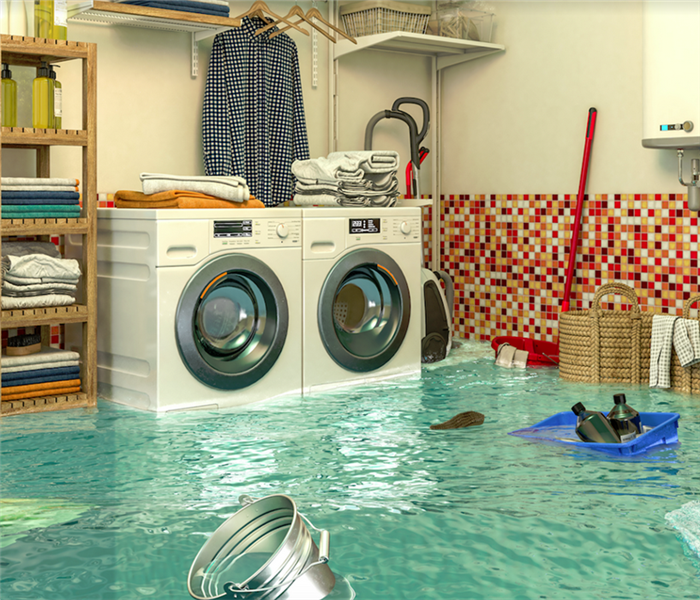 a flooded laundry room with items floating everywhere